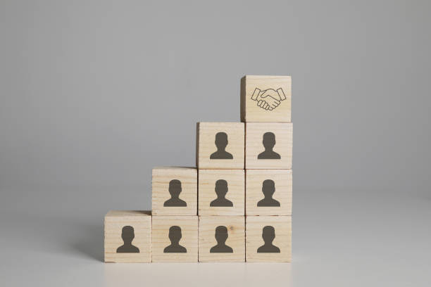 istock Teamwork blocks cubes handshake cooperation partnership business growth leadership 2187140946