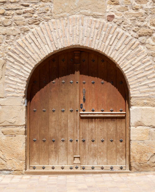 istock Old wooden gate of an historic building 2187142500