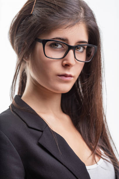 istock Young businesswoman wearing eyeglasses with serious expression posing in studio 2187143042