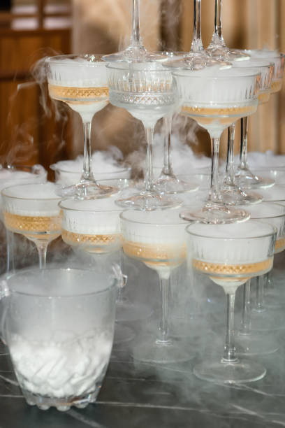 istock Glasses of steaming champagne. 2187143605