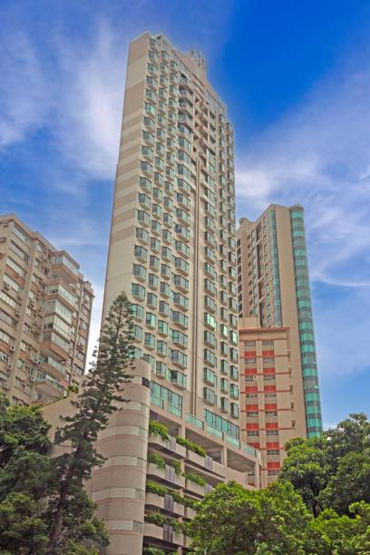 istock Dense urban architecture in Hong Kong with tightly packed high-rise buildings under a bright sky 2187145169