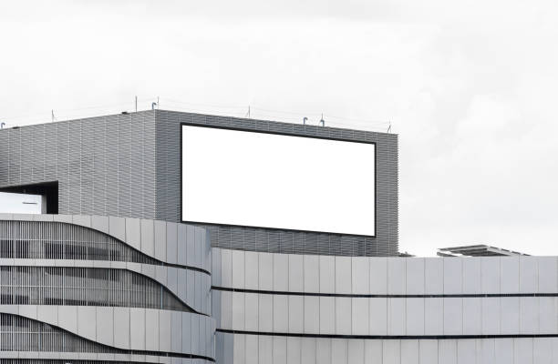 istock Mock up white LED display billboard on shopping mall building. Clipping path for mockup 2187145397