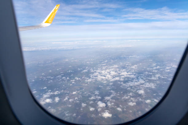 Clouds and sky from airplane window view