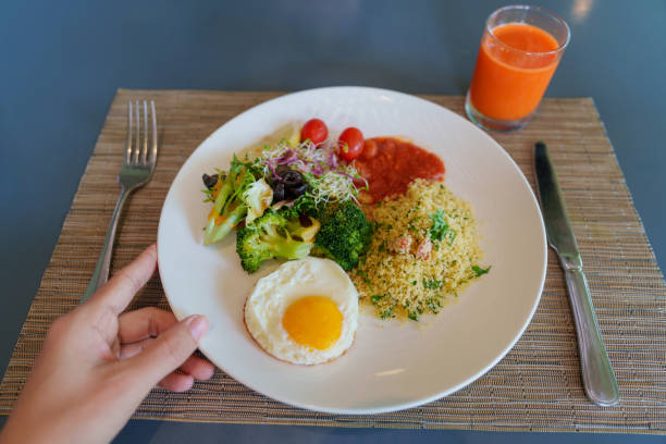 Nutritious Plant-Based Meal with Couscous, Broccoli, and Fresh Juice