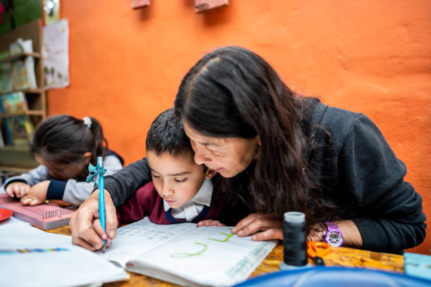 istock Teacher teaching her students on art class at school 2187159568