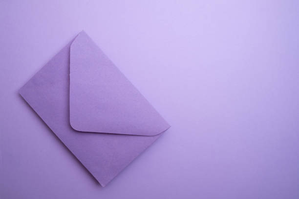 istock Paper envelopes on a light background. New mail, write a message. Send and receive mail. Postal delivery service. Empty envelope, empty space. Communication with people, paperwork. Envelope close-up 2187163635