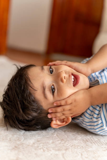 istock Portrait of a boy at home. 2187165417