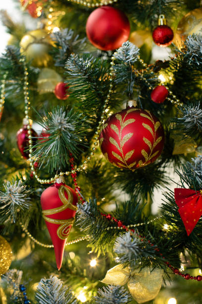 istock Red baubles and decorations on christmas tree for background. New Year concept. 2187169014