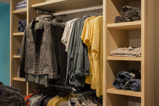 istock Man casual clothes hanging in the store 2187169103