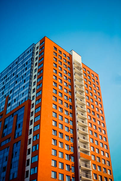 a new urban neighborhood with high-rise multi-storey buildings in St. Petersburg. dense residential development with many apartments. affordable economy class housing