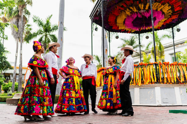 istock Young chiapanecos (traditional mexican dancers) talking outdoors 2187176441
