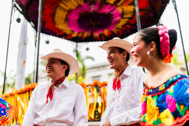 istock Young chiapanecos (traditional mexican dancers) talking outdoors 2187176551