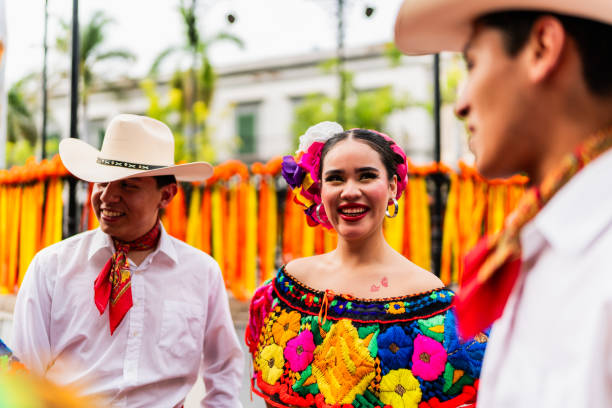 istock Young chiapanecos (traditional mexican dancers) talking outdoors 2187176555
