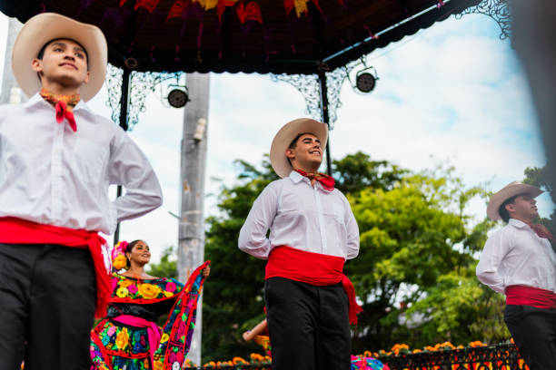 istock Young chiapanecos (traditional mexican dancers) dancing outdoors 2187177051