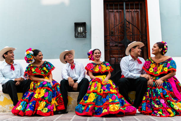 istock Young chiapanecos (traditional mexican dancers) talking outdoors 2187177229