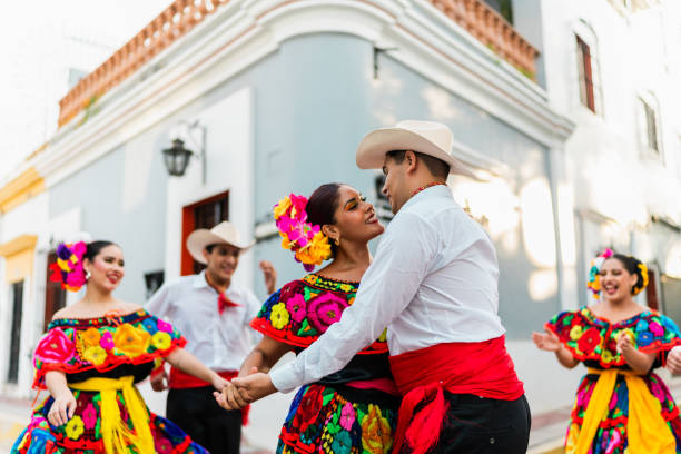 istock Young chiapaneco couple (traditional mexican dancers) dancing outdoors 2187177392