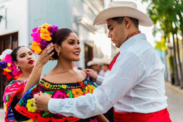 istock Young chiapanecos (traditional mexican dancers) preparing to dancing outdoors 2187177407