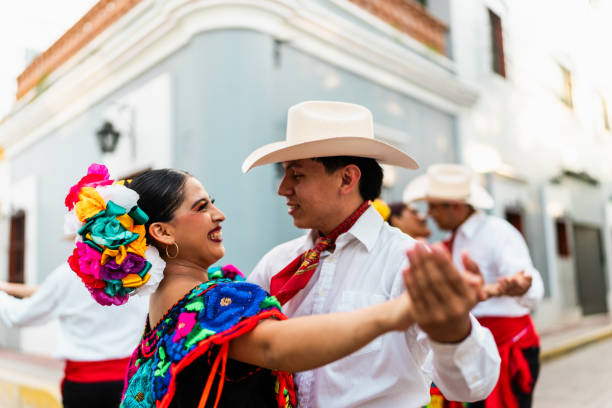 istock Young chiapanecos couple (traditional mexican dancers) dancing outdoors 2187177453