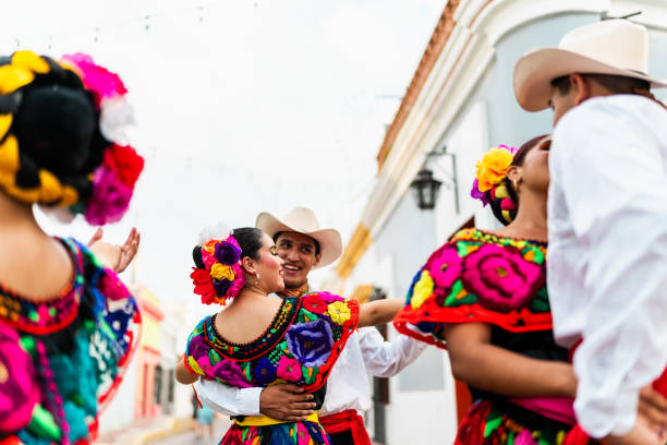 istock Young chiapanecos couple (traditional mexican dancers) dancing outdoors 2187177476