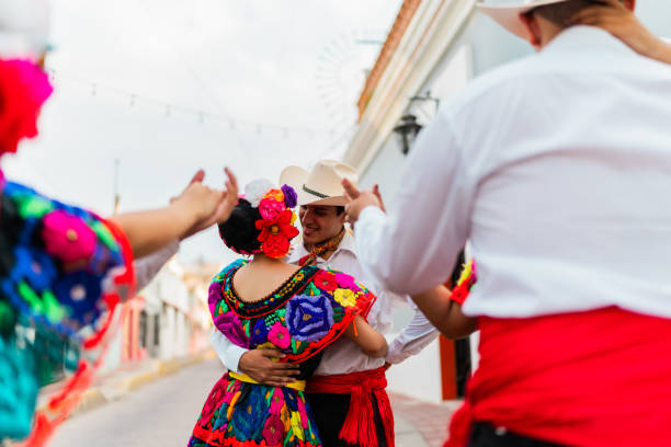 istock Young chiapanecos couple (traditional mexican dancers) dancing outdoors 2187177499
