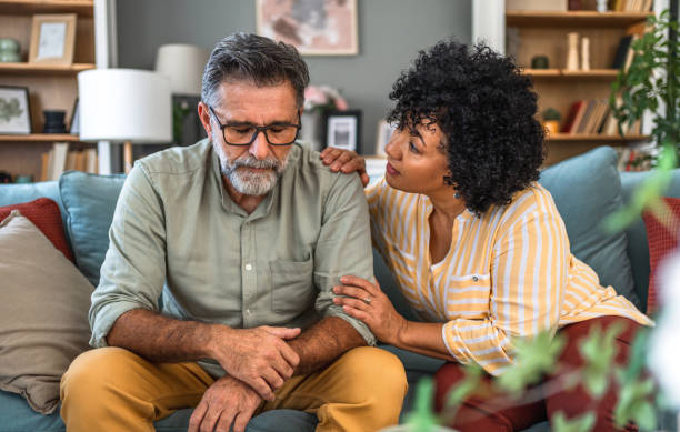 istock Woman comforting her husband 2187179937