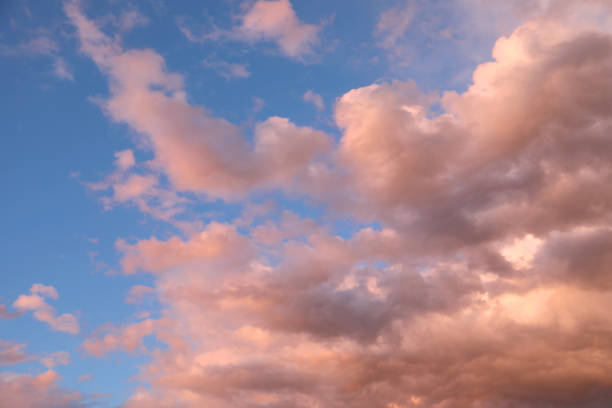 istock Soft pink clouds at sunset and the sky as the ideal romantic background 2187180001