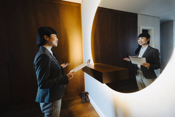 istock One woman rehearsing a speech in mirror at home 2187183161
