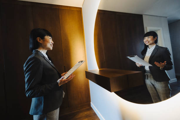 istock One woman rehearsing a speech in mirror at home 2187183177
