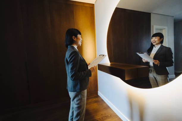 istock One woman rehearsing a speech in mirror at home 2187184124