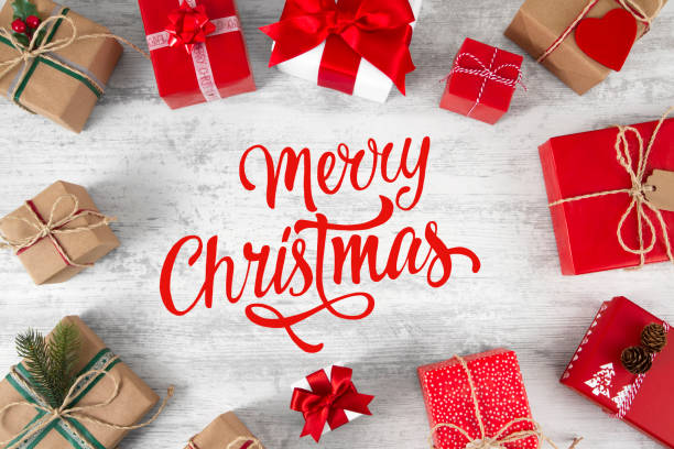 istock Christmas Background with Gift Boxes and Christmas Message 2187185915