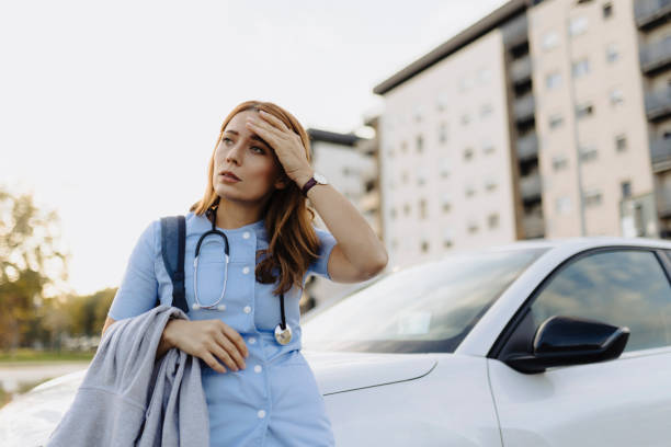 istock Tired nurse ready to go home after work 2187189113