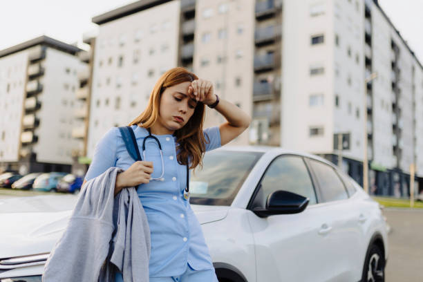 istock Tired nurse ready to go home after work 2187190578