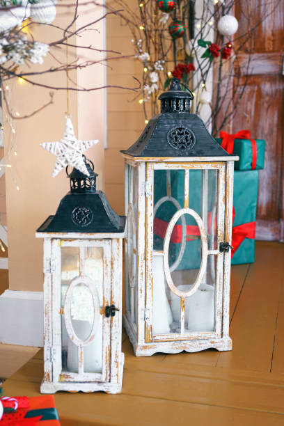 Decorative lanterns enhance Christmas holiday ambiance in cozy interior setting