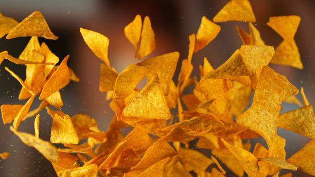 istock Freeze motion of flying tortilla chips 2187193881