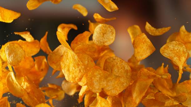 istock Freeze motion of flying fried potatoes chips 2187193912