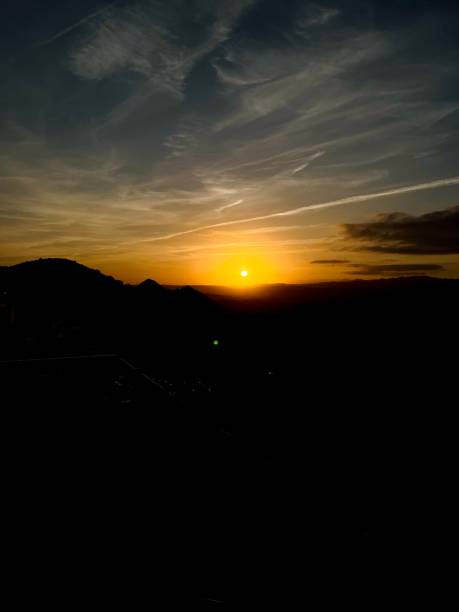 istock Stunning orange sunset over majestic mountain landscape 2187195925