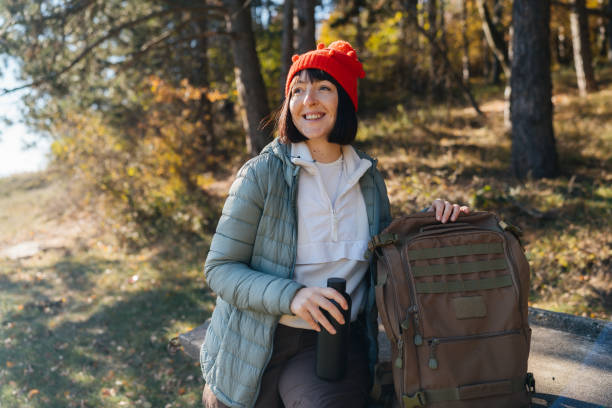 istock Woman prepare for a hike in the forest 2187199548