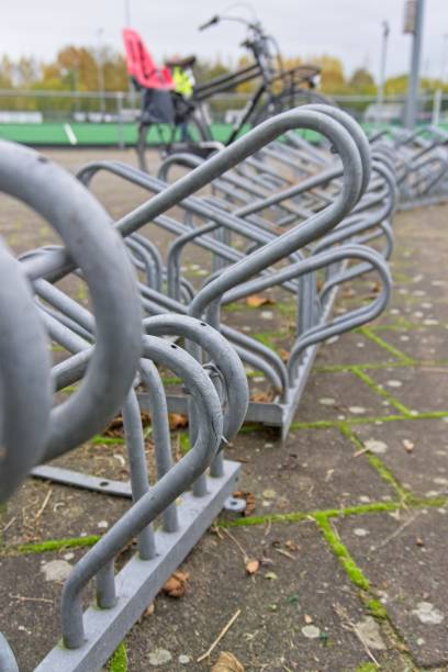 istock Bicycle rack with a parked men's bike 2187199638
