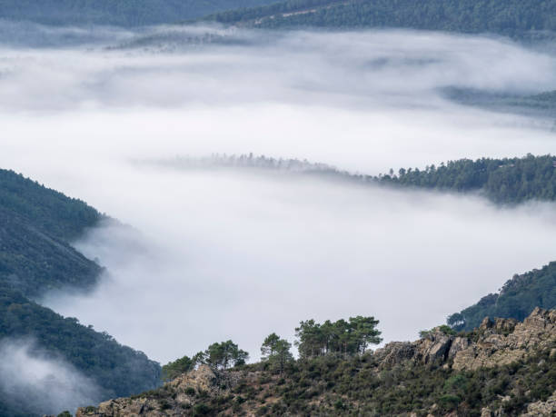 Mountain landscape with fog at dawn. Batuecas Valley. Sierra de Francia, La Alberca