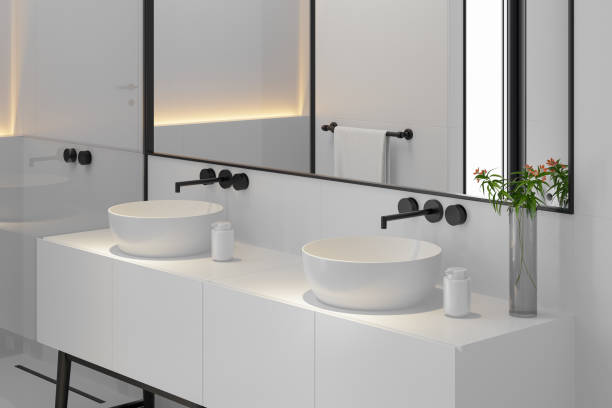 istock Minimalist Luxury Bathroom with White Walls and Dark Flooring 2187202846