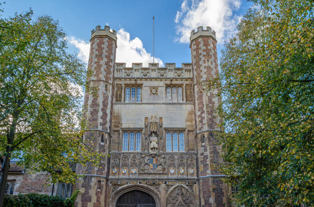 Cambridge, UK - October 11, 2014: The Great Gate of the Trinity College in Cambridge, UK. A statue of the college founder, Henry VIII, stands in a niche above the doorway. Trinity College is a constituent college of the University of Cambridge