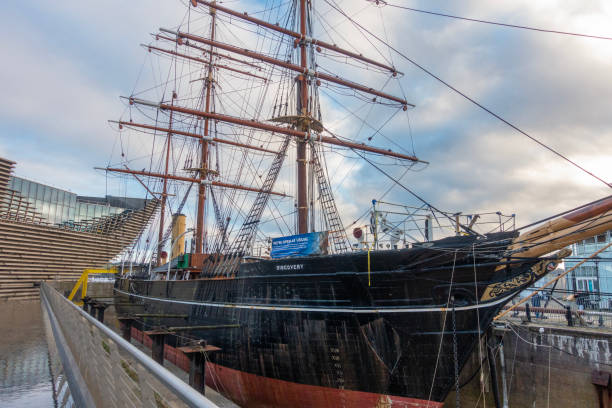 The RRS Discovery in a custom-built dry dock next to V&A Dundee, Scotland, It is visitable as part of Discovery Point, which expores the voyages of the three-mast wooden barque, the last to be built in the UK. The most famous of her voyages was the British National Antarctic Expedition, whuich  took Scott and Shacklet into the Antarctic..