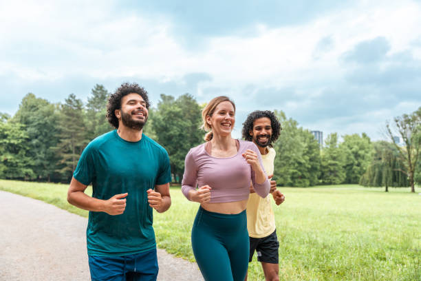 istock Diverse Friends Enjoying Park Jog Together 2187215522