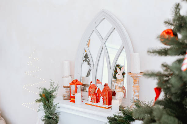 istock Decorative Christmas display with mirror and festive ornaments in cozy setting 2187215857