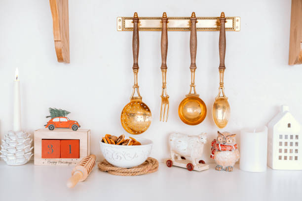 Decorative kitchen utensils and cozy decor on a modern countertop display