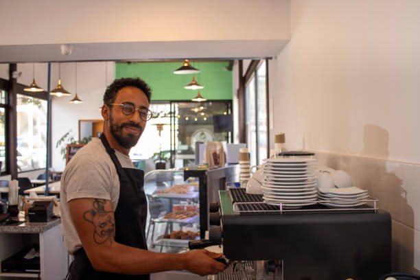 istock Barista preparing coffee in cozy coffee shop 2187219271