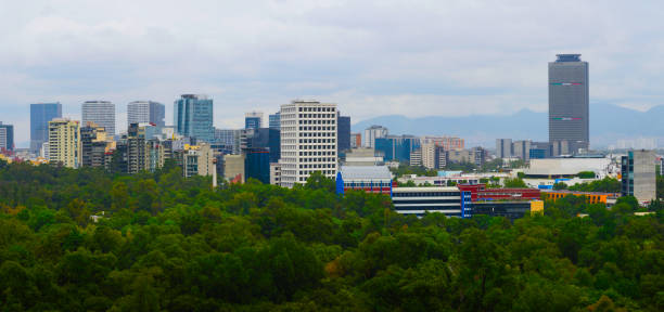 Mexico City Skyline Panorama over the Mountains, a view from the Bosque de Chapultepec in Ciudad de México