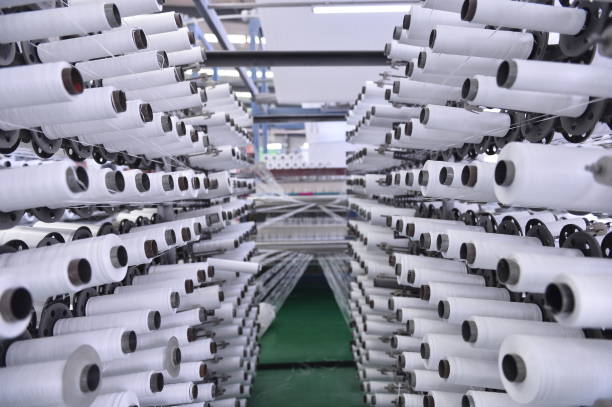 istock Cotton textile factory equipment is in operation 2187243902