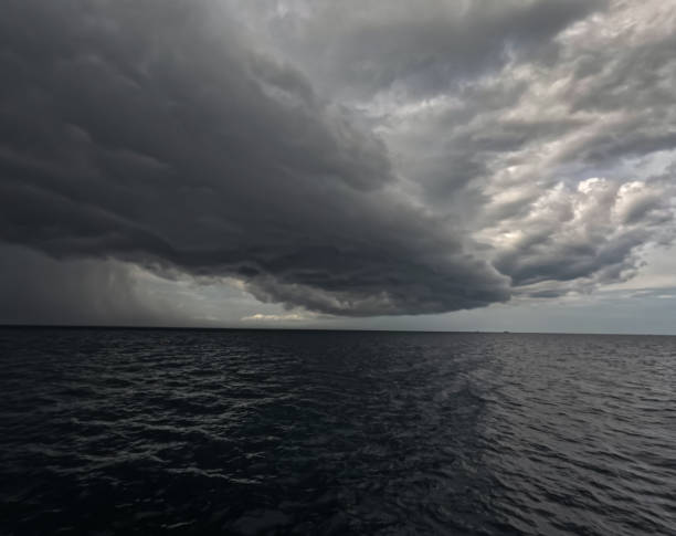 istock Dark with Dramatic blue sky and dark as Dramatic blue sea color and dark storm raining cloud background 2187244520