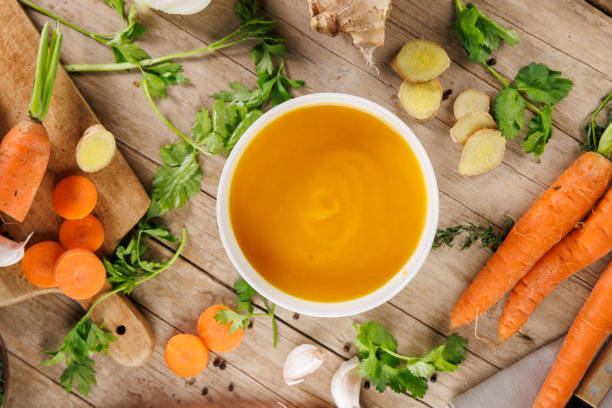 istock bowl of vegetable soup on wooden table 2187247107